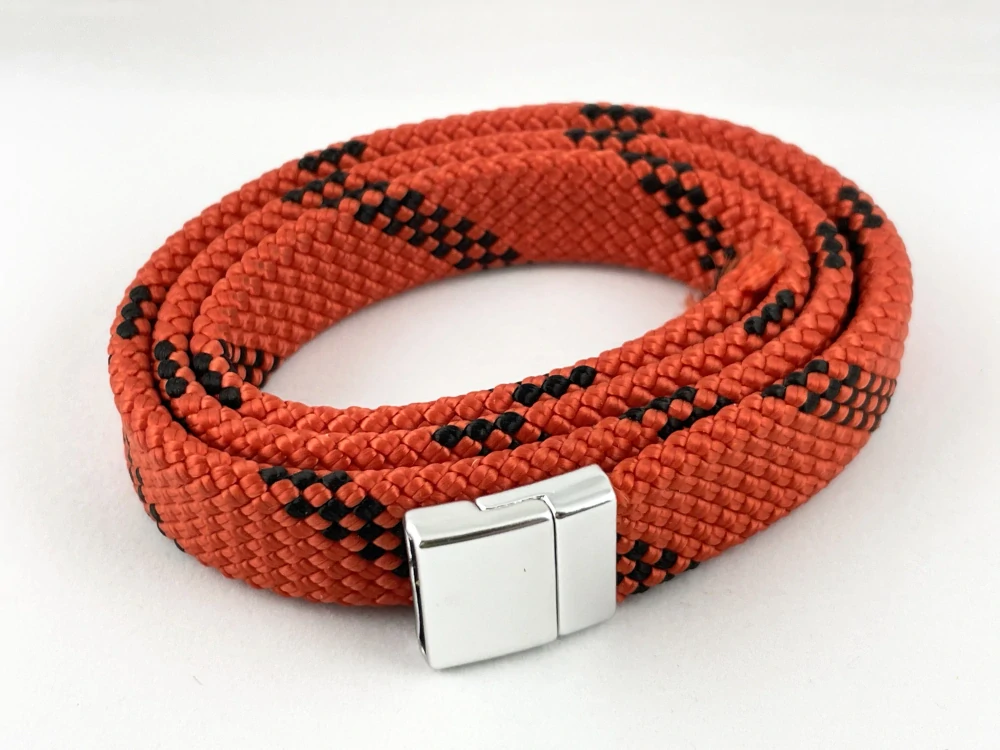 Náramek Oplet oranžovo-černý (Polo)